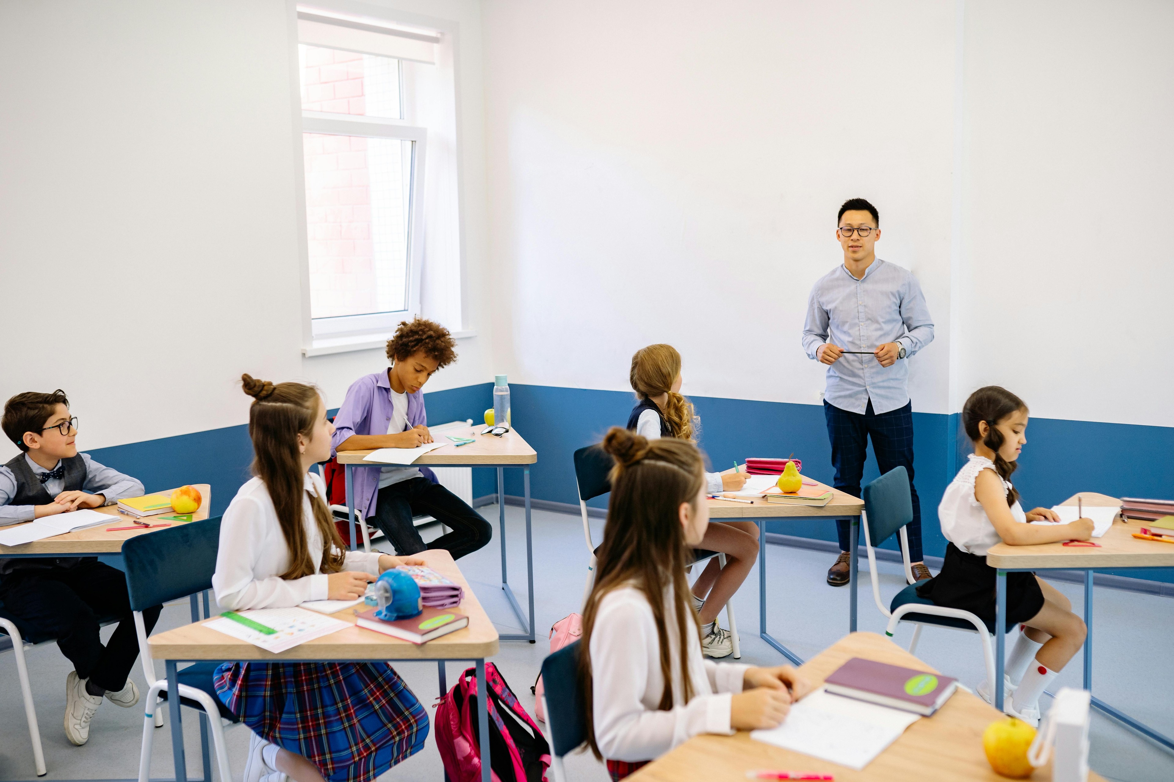 Students learning together in a school classroom
